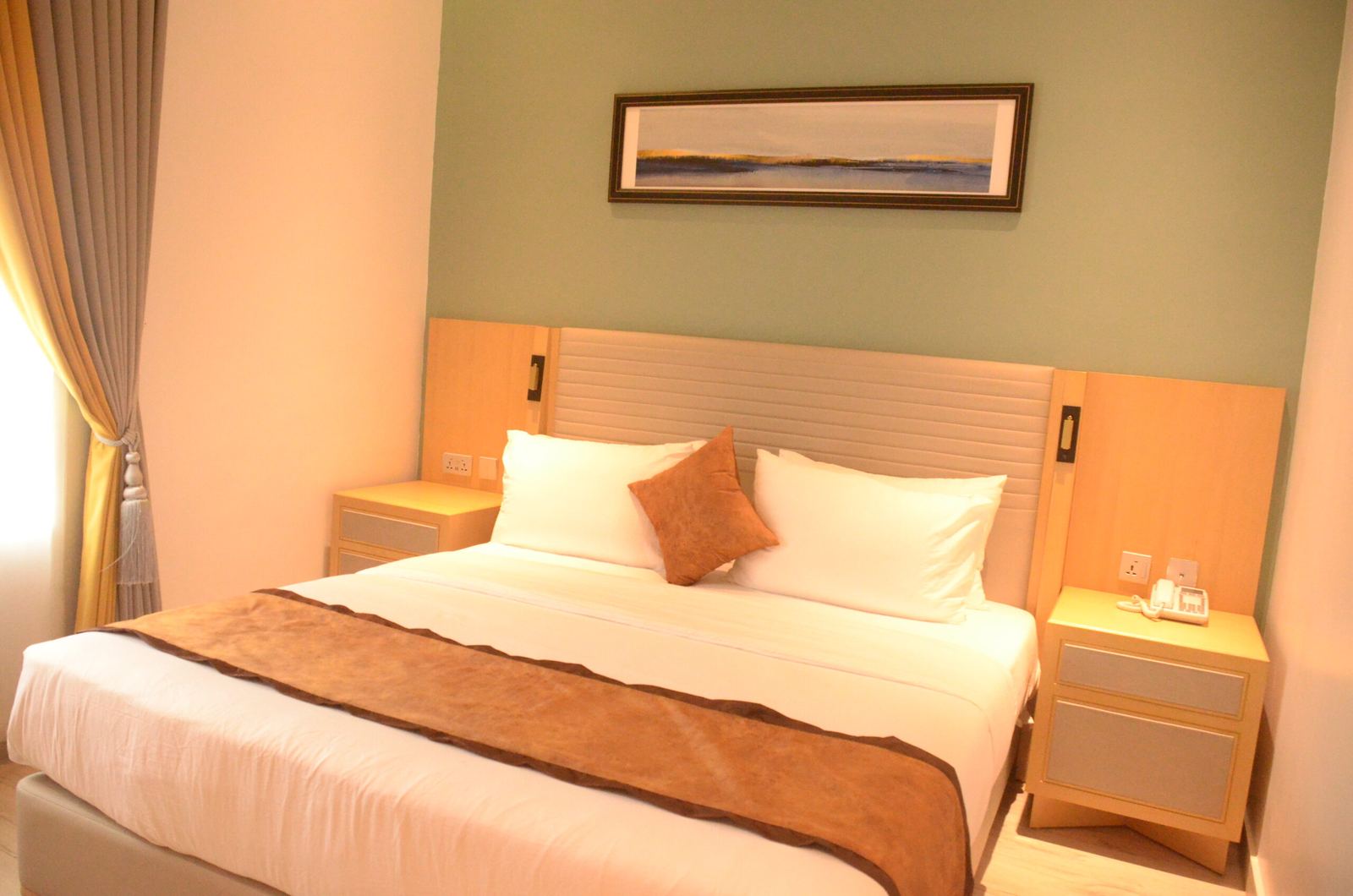Guest room at LimeRidge Signature Hotel